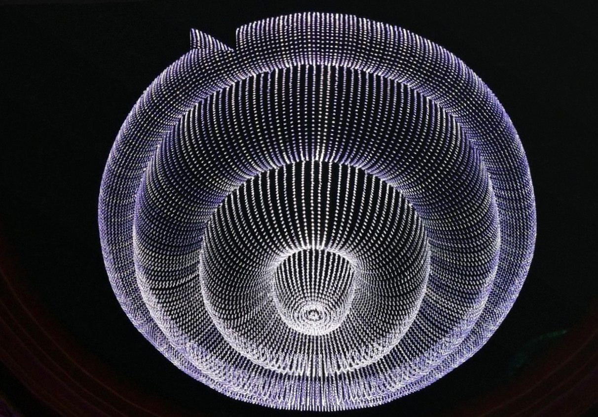 Crystal chandelier above a formal dining table